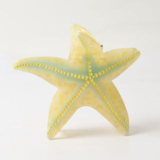 Pince étoile de mer jaune
